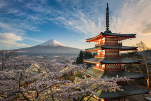 Mount Fuji with a red pagoda in spring season with cherry blossoms, Japan Mount Fuji with a red pagoda in spring season with cherry blossoms, Japan